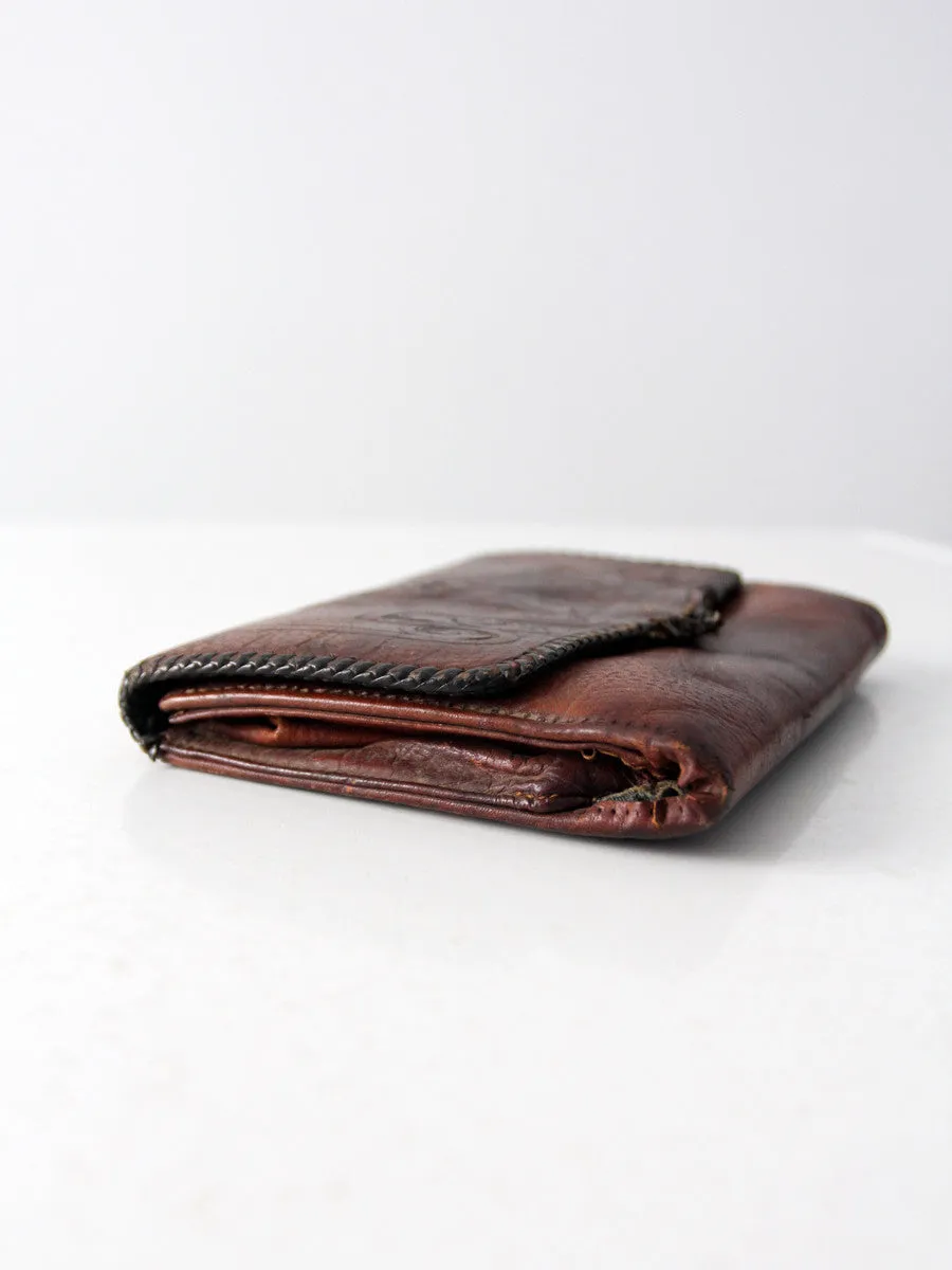 antique leather clutch with art nouveau tooling