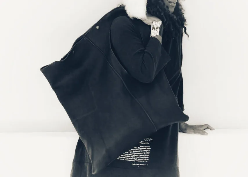 Asymmetrical leather bag solid black or with eye print