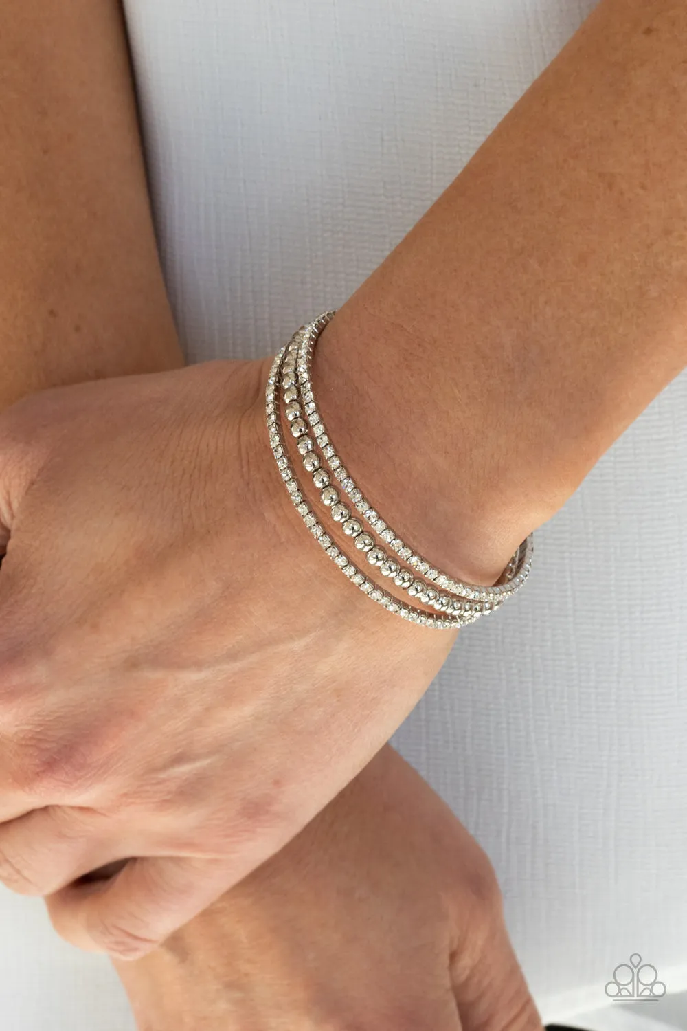 High-End Eye Candy - White Bracelet - Paparazzi Accessories
